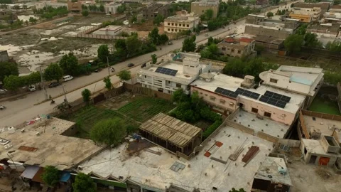 Urban patchwork of Badin, Sindh from above, Aerial Panoramic Video stock 257870356