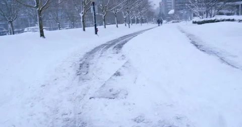 Urban path during snow storm Video stock 129783909