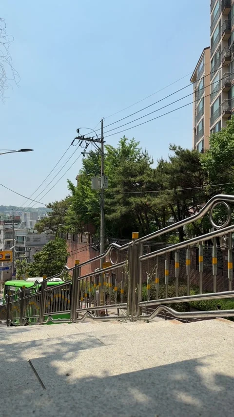 Urban Pedestrian Overpass With Utility Pole and Traffic Below Stock Footage 340413719