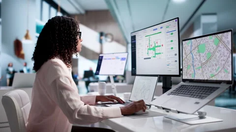 Urban Planner Reviews Electronic Permit System On Desktop Stock Footage 341010641