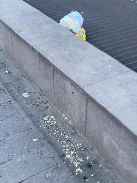 Urban pollution creating a messy environment with litter and waste on a Cre.. Stock Photos