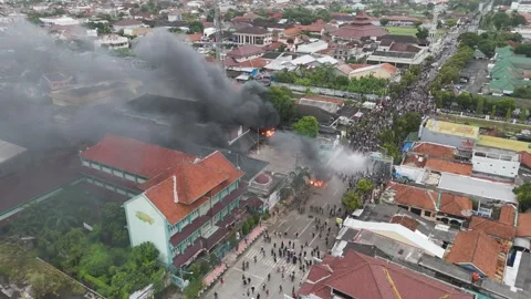 Urban Protest with Fire and Thick Smoke in City Street Stock Footage 333224414