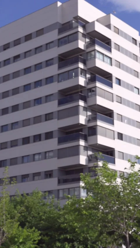 Urban residential complex shown in bright daylight Stock Footage 336668779