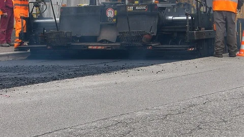 Urban road under construction, asphalting in progress. Stock Footage 87084174