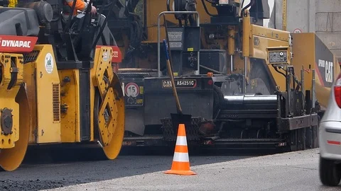 Urban road under construction, asphalting in progress. Stock Footage 87084182