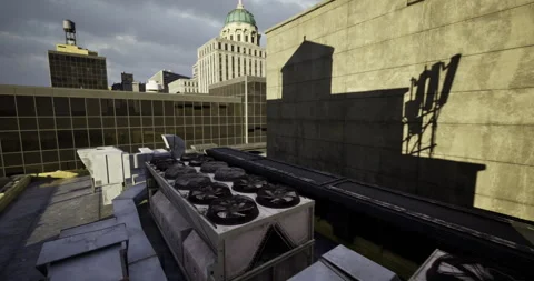 Urban rooftop setting with air conditioning units and cityscape in background 스톡 동영상 319821881