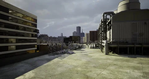 Urban rooftop view with industrial elements under cloudy sky Stock Footage 321782398
