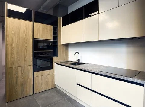 Urban rustic loft style kitchen interior in wooden facade and stoneware Stock Photos