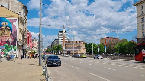 Urban scene in central Sofia with Banya Bashi Mosque and its minaret in the Stock Footage 312184898