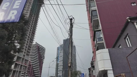 Urban scene with power lines and buildings in batumi georgia Stock Footage 333499599