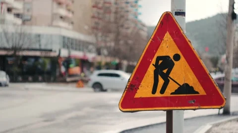 Urban shot of a road work warning sign Video stock 328253748