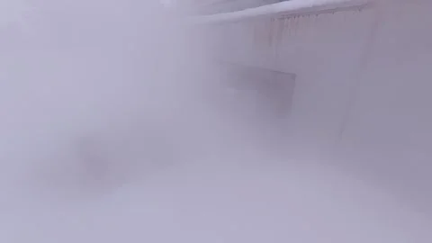 Urban steam cloud from underground pipes in winter Stock Footage 324342225