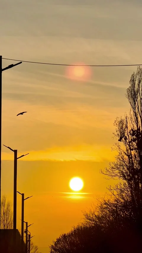 Urban sunset with glowing sun and soft sky gradient Stock Footage 341436738
