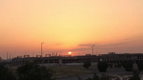 Urban sunset over construction site silhouette Stock Footage 334718745