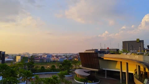 Urban Sunset Overlooking Trees and Buildings with Beautiful Sky Colors Stock Footage 308344571