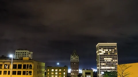 Urban time lapse with clouds at night Stock Footage 123392330