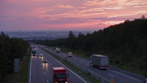 Urban Traffic at Dawn Stock Footage 165460799