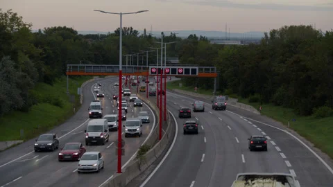 Urban Traffic at Dawn Stock Footage 165461709