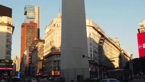 Urban Traffic at Obelisk Intersection with Coca Cola and McDonalds Billboards Stock Footage 333907233