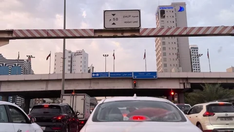 Urban Traffic at Underpass with Height Limit Sign and City Buildings Stock Footage 331610012