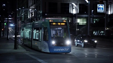 Urban train car passing through the city. Stock Footage 99132377