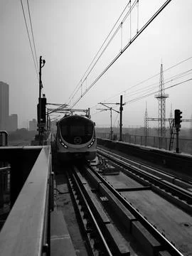 Urban Train on Elevated Track in Black and White Stock Photos