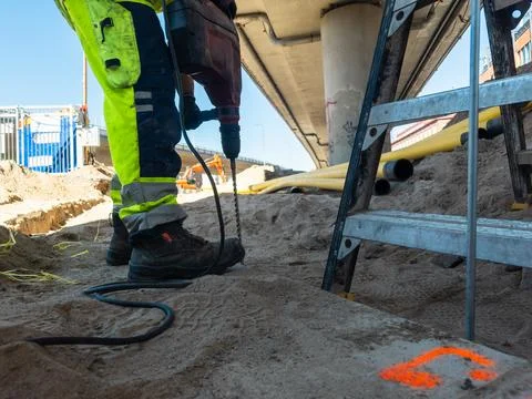 Urban utility installation supporting future transportation development. Stock Photos