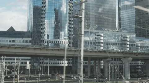 Urban view from train window. Bridge constructions with road with cars Video stock 146030400