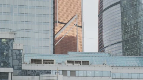 Urban view from train window. Glass skyscrapers moving along. Stock Footage 134020262