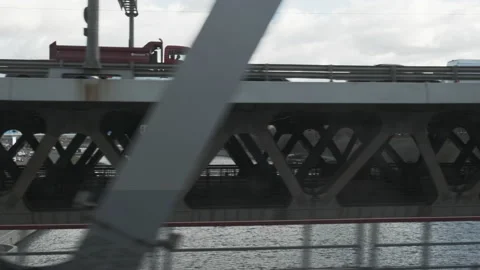 Urban view from train window. Highway with traffic with snow at winter. Stock Footage 143456991