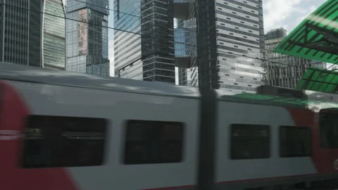 Urban view from train window. Highway with traffic with snow at winter. Stock Footage 146511422