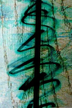 Urban wall surface with a layer of peeling paint and chaotic turquoise spray Stock Photos