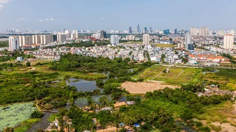 Urbanisation gaining on the nature in Ho Chi Minh City, Vietnam time lapse Stock Footage 116878367