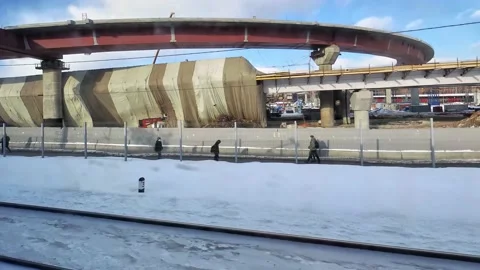 Urbanisation, a view from a train window of the construction of a multi-lane Stock Footage 150200157