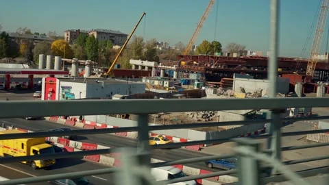 Urbanisation, a view from a train window of the construction of a multi-lane Stock Footage 164931610