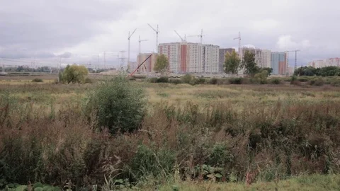 Urbanization. Construction of buildings in the field. 스톡 동영상 80947675
