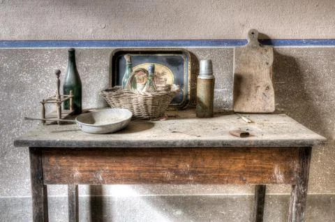 Urbex an old table on which bottles Stock Photos