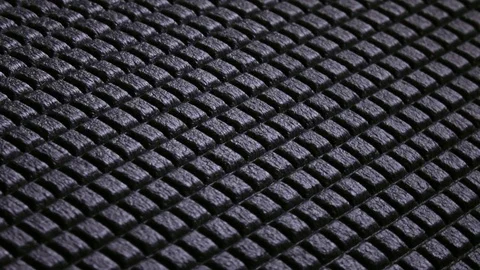 Urethane foam flat surface with grid structure close up, rotating clockwise Stock Footage 84112028