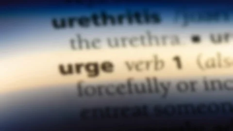 Urge word in a dictionary. Stock Footage 99562525