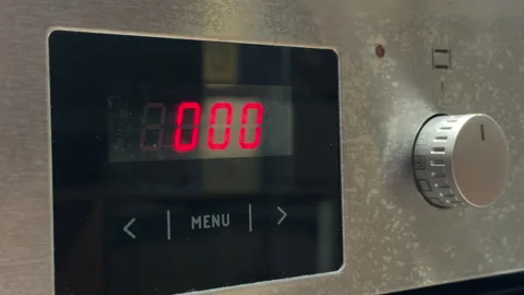 Urgent Electric Oven Timer Alerts the Kitchen With Sharp Electronic Beeps Stock Footage 328797852