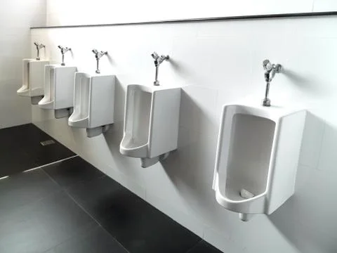 The urinal in the bathroom Stock Photos