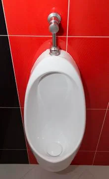 Urinal in the restroom Stock Photos