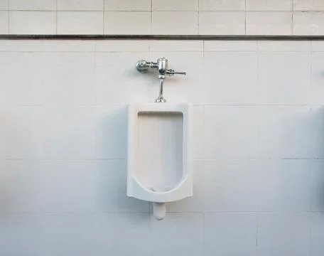 Urinal Tile Wall 库存照片