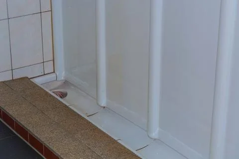 Urinal trough or gutter Pinkel made of ceramic Fotos de archivo