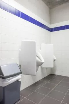 Urinal on the wall Foto stock