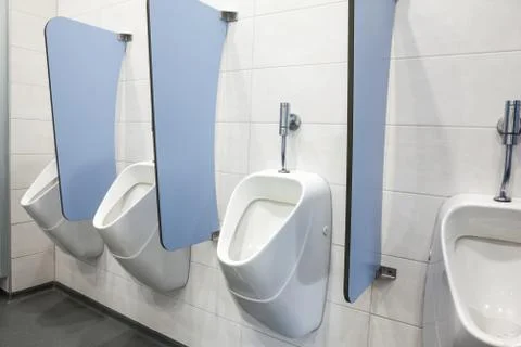 Urinal on the wall Stock Photos