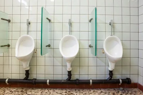 Urinal on the wall Foto stock