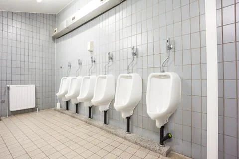Urinal on the wall Stock Photos