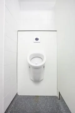 Urinal on the wall Stock Photos