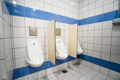 Urinal on the wall Stock Photos